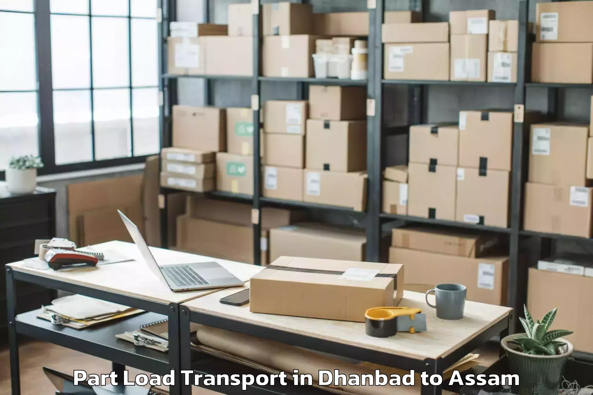 Book Dhanbad to Morigaon Part Load Transport Online